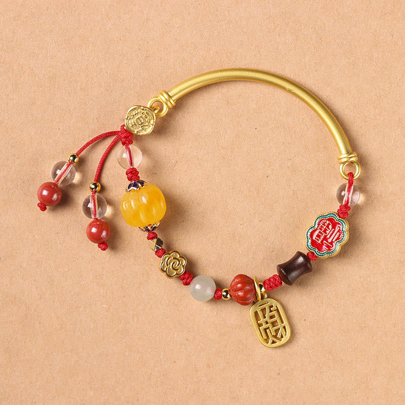 Bracelet de richesse en cuivre avec nuages ​​de bon augure pour la chance et la prospérité
