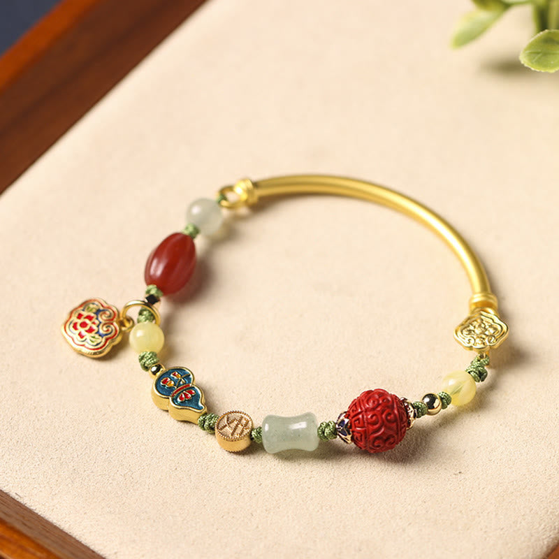 Bracelet de richesse en cuivre avec nuages ​​de bon augure pour la chance et la prospérité