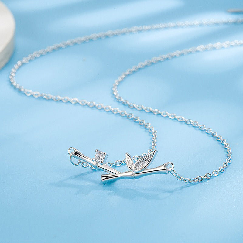 Collier spirituel en feuille de bambou en cuivre pour la richesse et la croissance