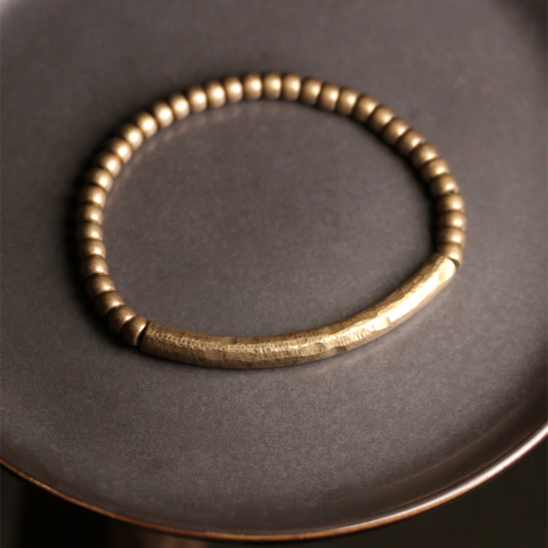 Bracelet spirituel porte-bonheur et richesse en perles de cuivre et laiton