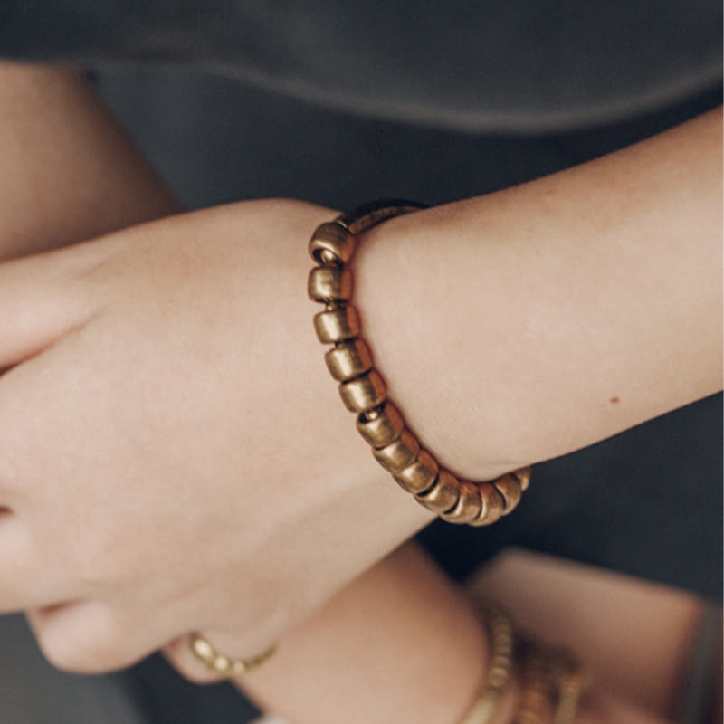 Bracelet spirituel porte-bonheur et richesse en perles de cuivre et laiton
