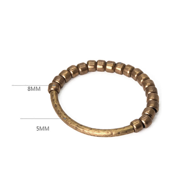 Bracelet spirituel porte-bonheur et richesse en perles de cuivre et laiton