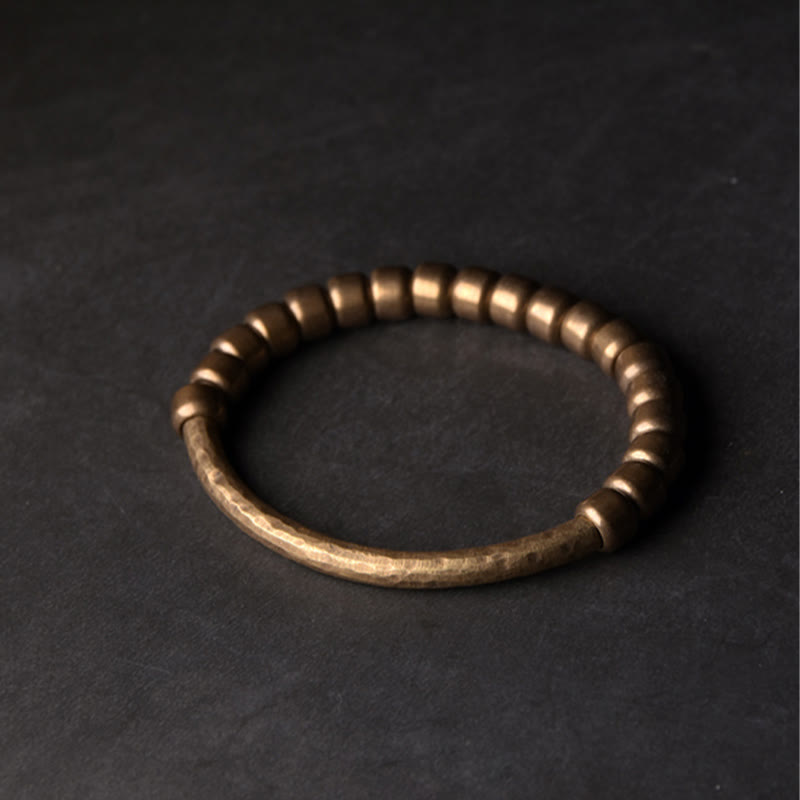 Bracelet spirituel porte-bonheur et richesse en perles de cuivre et laiton