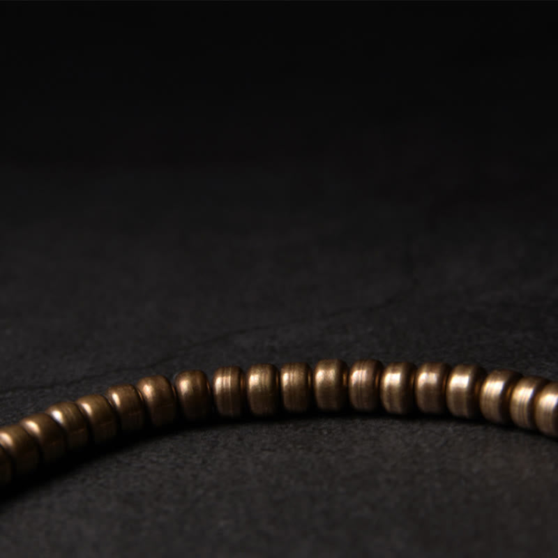 Bracelet spirituel porte-bonheur et richesse en perles de cuivre et laiton