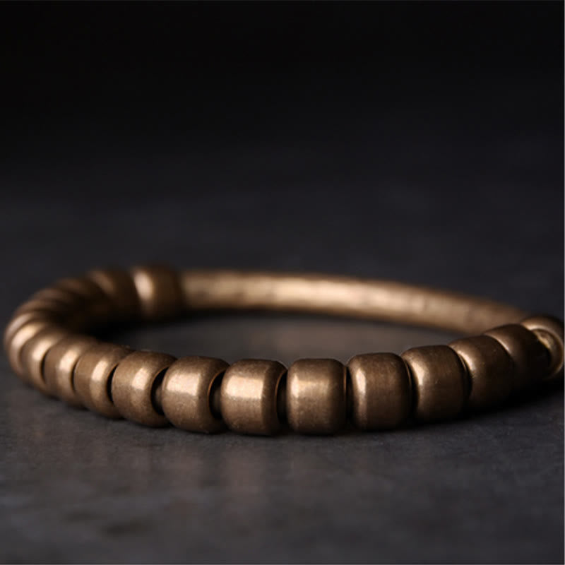 Bracelet spirituel porte-bonheur et richesse en perles de cuivre et laiton