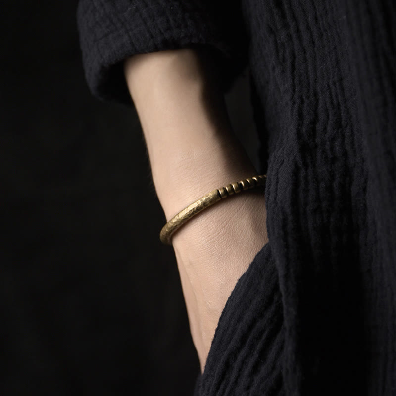 Bracelet spirituel porte-bonheur et richesse en perles de cuivre et laiton