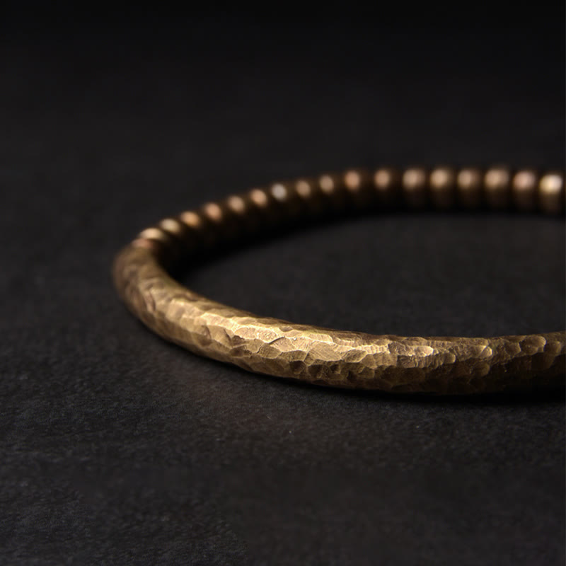 Bracelet spirituel porte-bonheur et richesse en perles de cuivre et laiton