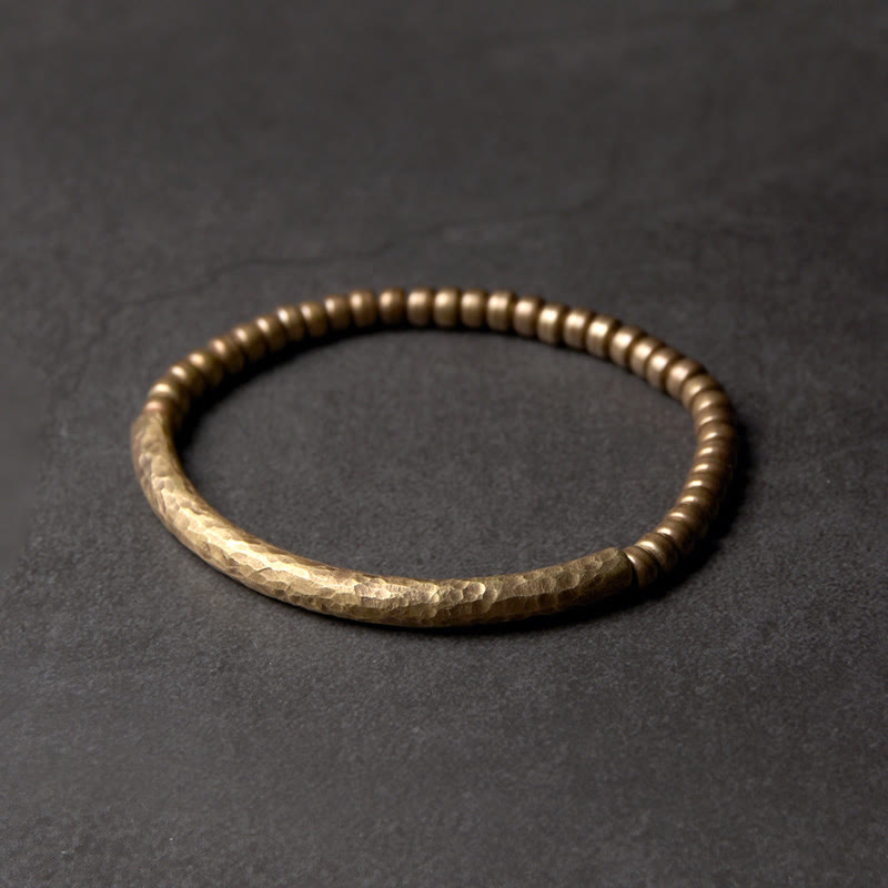 Bracelet spirituel porte-bonheur et richesse en perles de cuivre et laiton