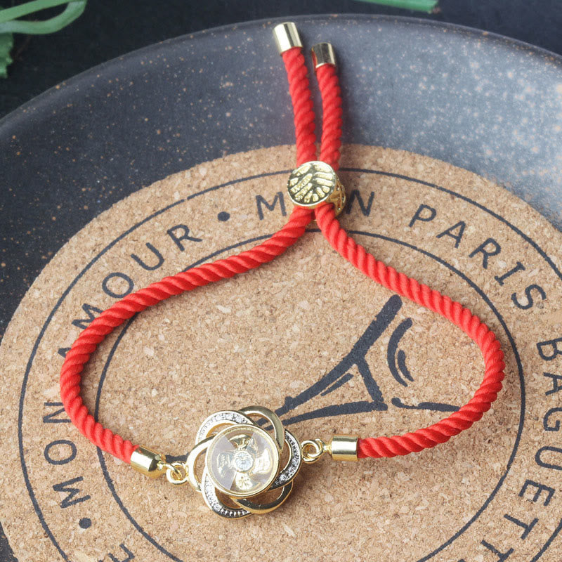 Bracelet de protection en cuivre et laiton avec moulin à vent et prune, cordon rouge