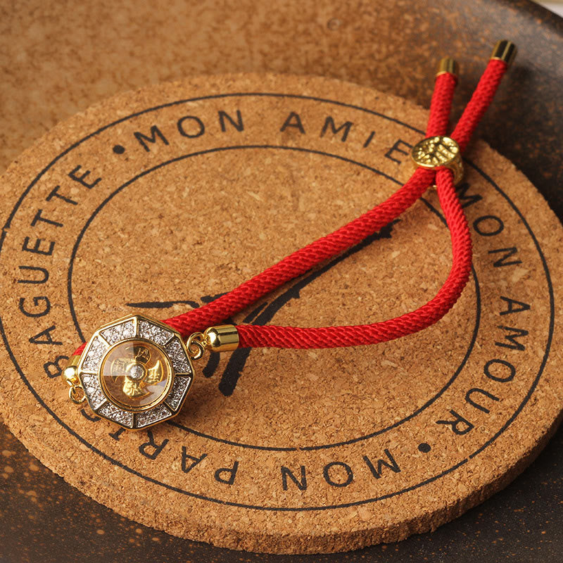 Bracelet Feng Shui en cuivre et laiton avec fil rouge et moulin à vent