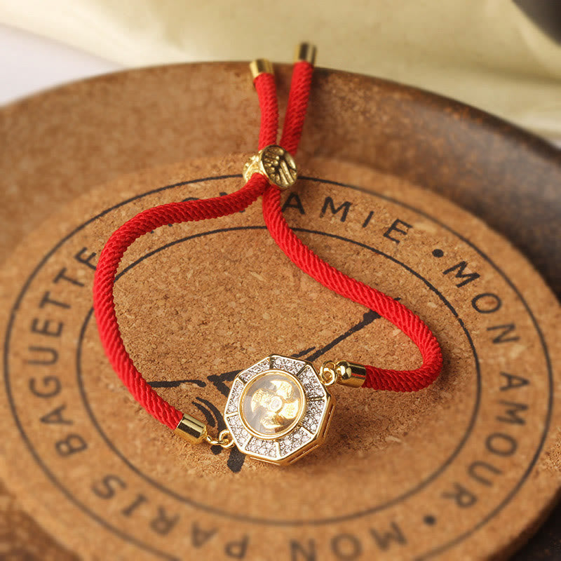 Bracelet Feng Shui en cuivre et laiton avec fil rouge et moulin à vent