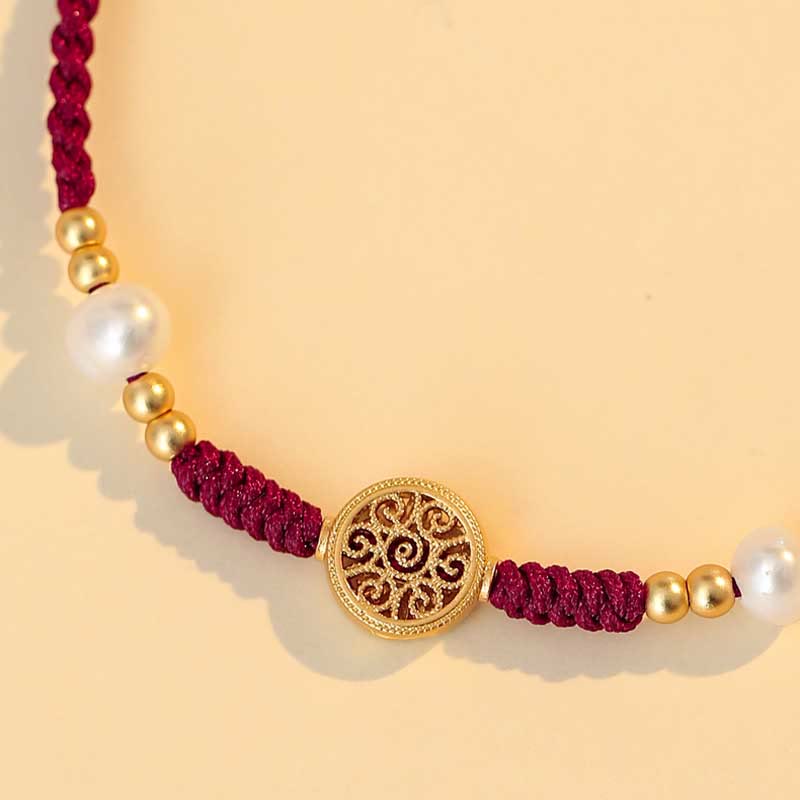Bracelet en fil rouge avec pièce de cuivre pour la chance et la protection
