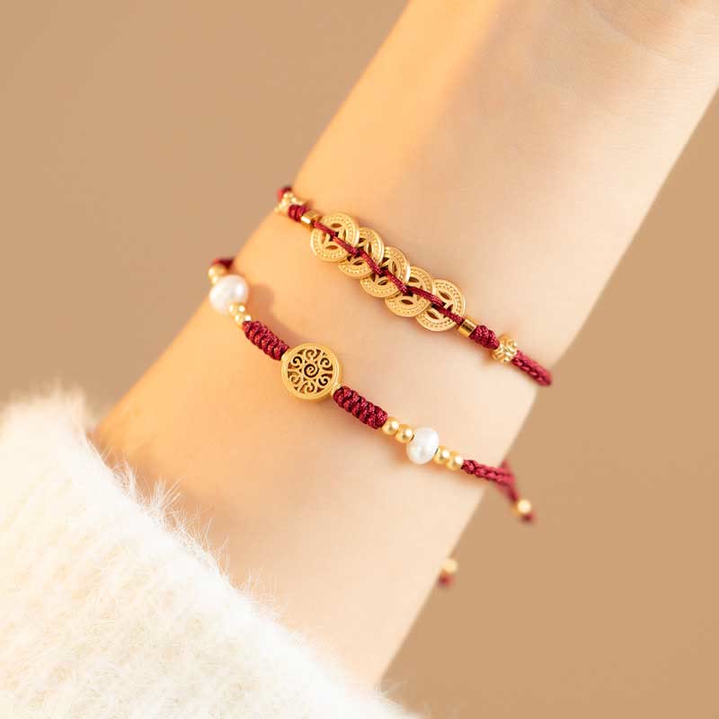 Bracelet en fil rouge avec pièce de cuivre pour la chance et la protection