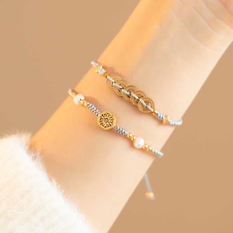 Bracelet en fil rouge avec pièce de cuivre pour la chance et la protection