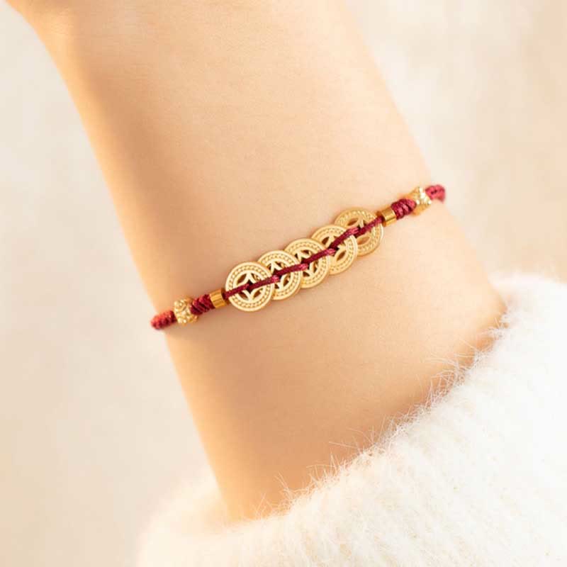 Bracelet en fil rouge avec pièce de cuivre pour la chance et la protection