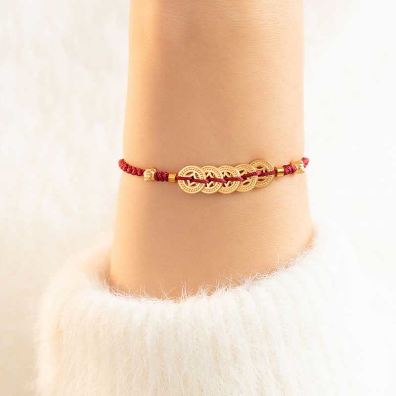 Bracelet en fil rouge avec pièce de cuivre pour la chance et la protection