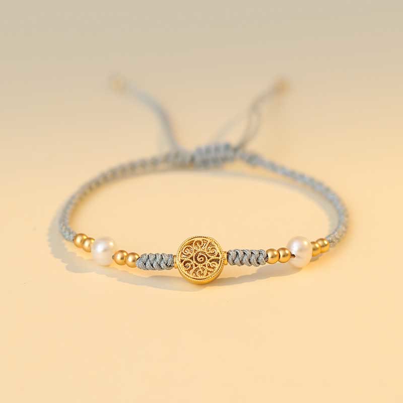 Bracelet en fil rouge avec pièce de cuivre pour la chance et la protection