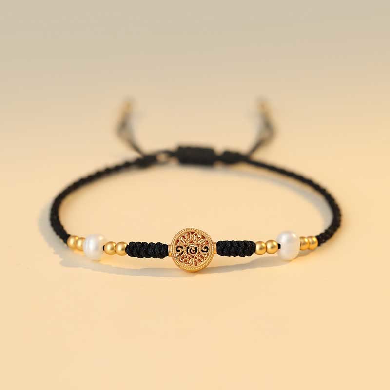 Bracelet en fil rouge avec pièce de cuivre pour la chance et la protection