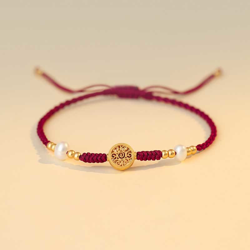 Bracelet en fil rouge avec pièce de cuivre pour la chance et la protection