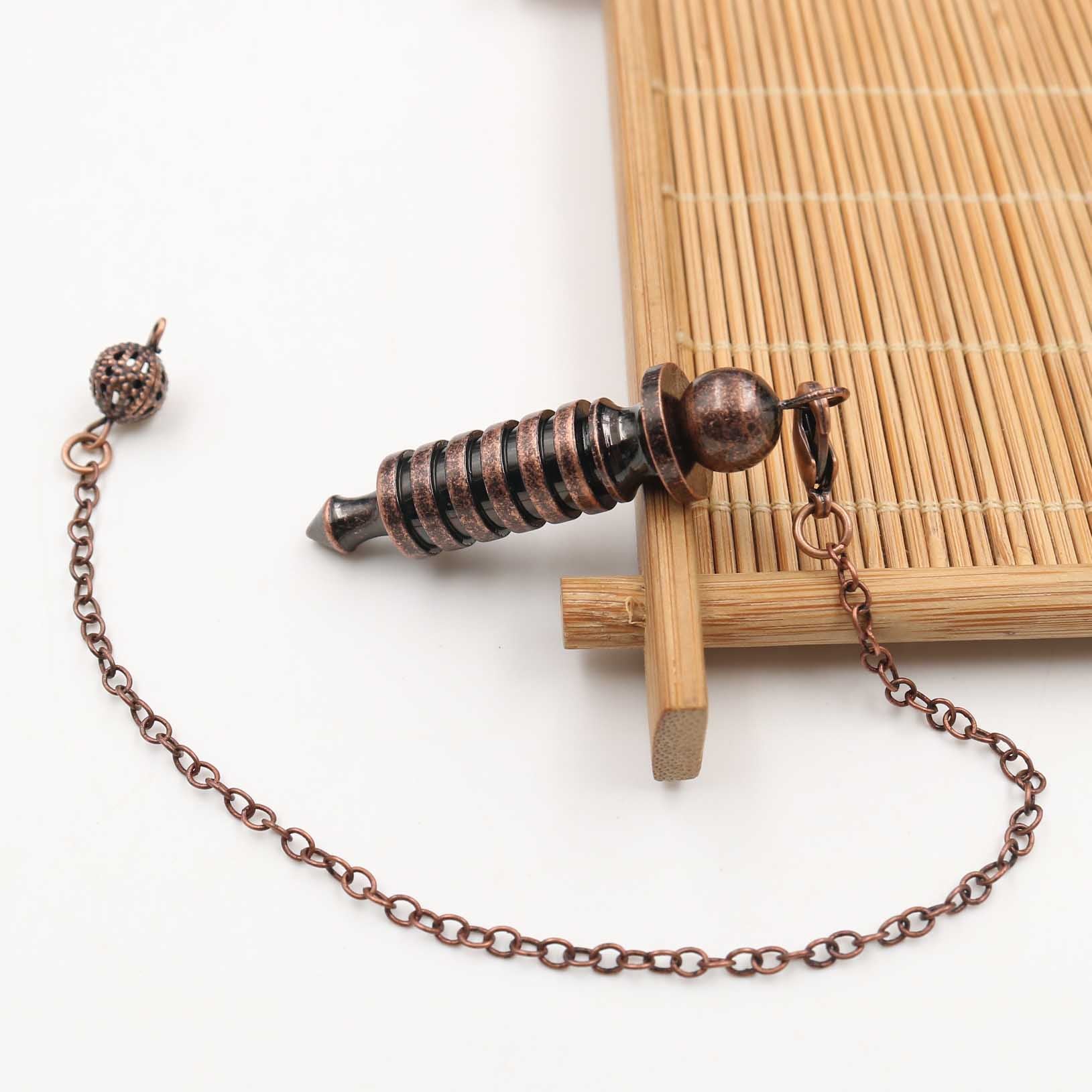 Pendule en cristal de cuivre pour la guérison spirituelle