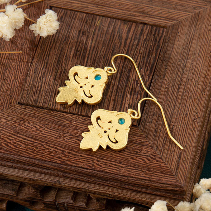 Boucles d'oreilles pendantes à énergie positive en cuivre émaillé turquoise
