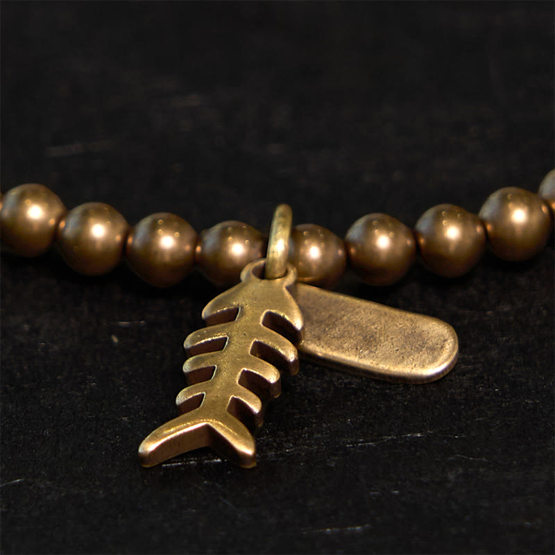 Bracelet de guérison en arête de poisson en cuivre pour le bien-être émotionnel