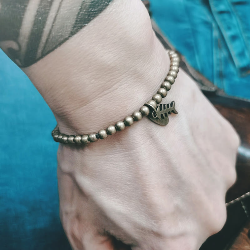 Bracelet de guérison en arête de poisson en cuivre pour le bien-être émotionnel
