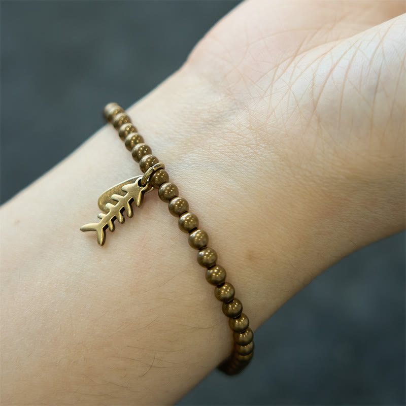 Bracelet de guérison en arête de poisson en cuivre pour le bien-être émotionnel