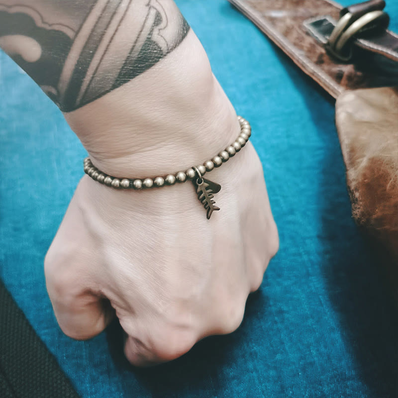 Bracelet de guérison en arête de poisson en cuivre pour le bien-être émotionnel