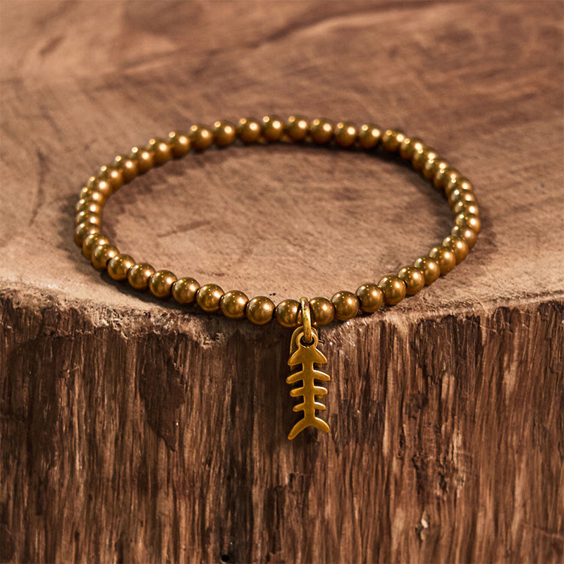 Bracelet de guérison en arête de poisson en cuivre pour le bien-être émotionnel