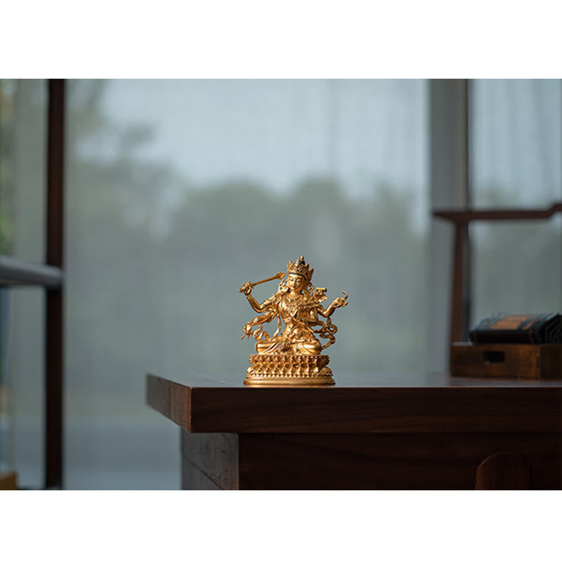 Statue du bodhisattva Manjusri à quatre bras en cuivre | Sérénité et compassion
