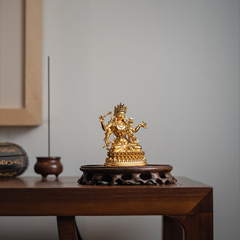 Statue du bodhisattva Manjusri à quatre bras en cuivre | Sérénité et compassion