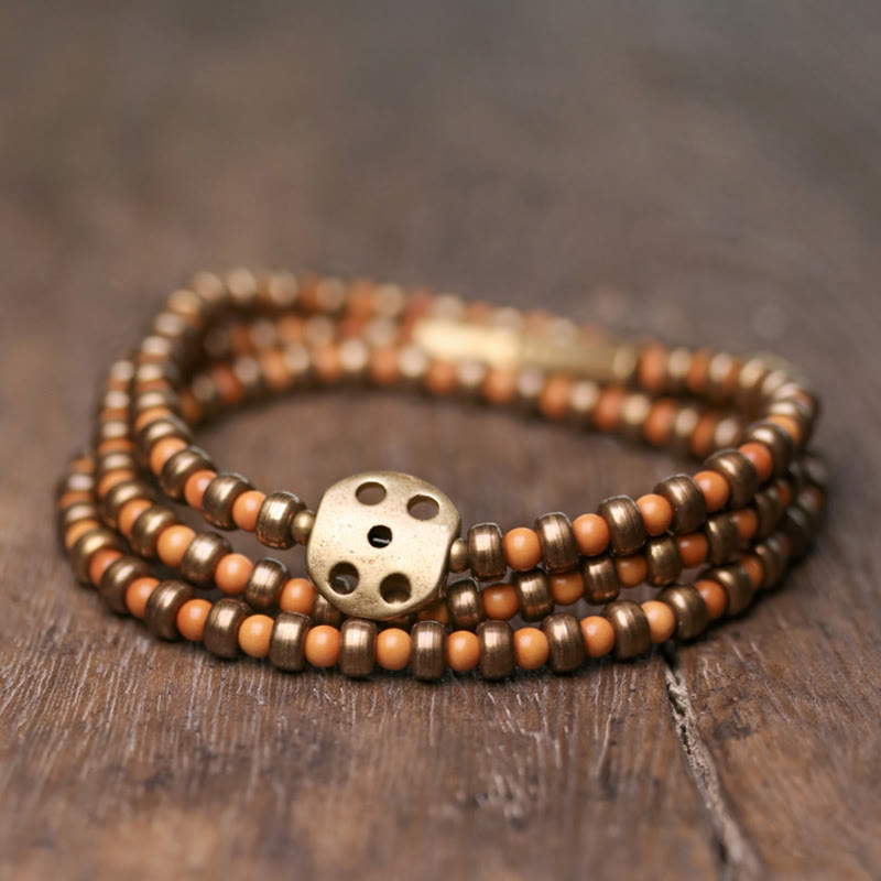 Bracelet spirituel en noyau d'olive en cuivre pour la richesse et l'équilibre