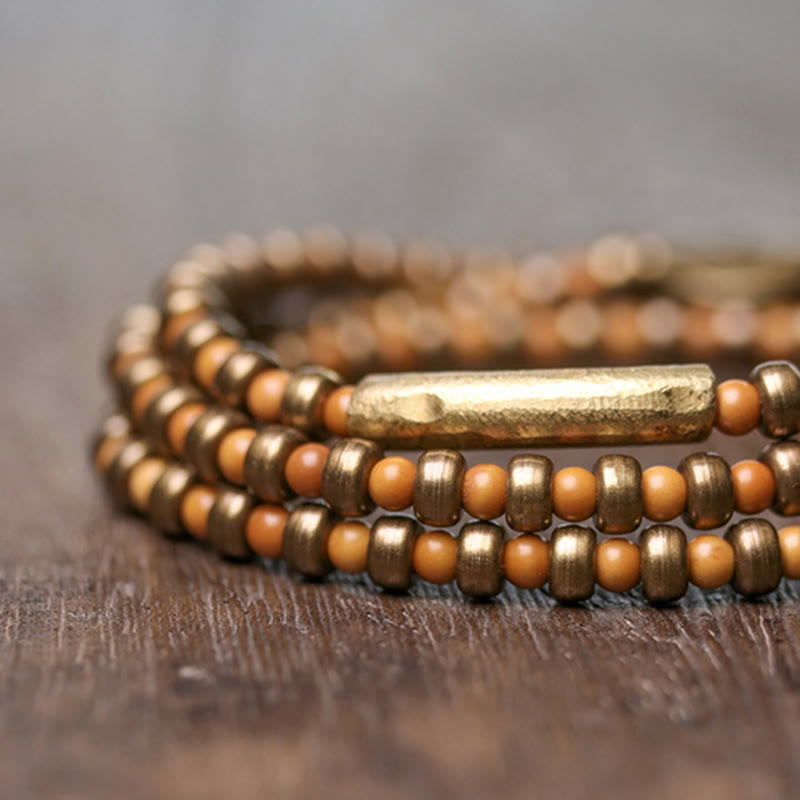 Bracelet spirituel en noyau d'olive en cuivre pour la richesse et l'équilibre