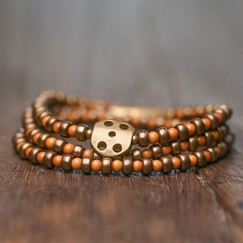 Bracelet spirituel en noyau d'olive en cuivre pour la richesse et l'équilibre