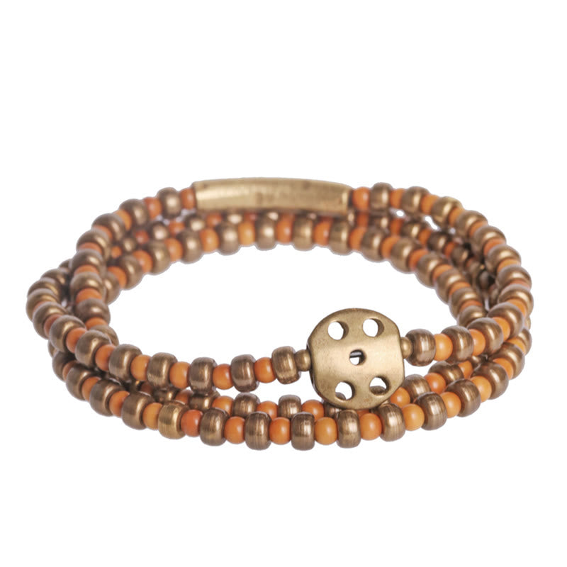 Bracelet spirituel en noyau d'olive en cuivre pour la richesse et l'équilibre