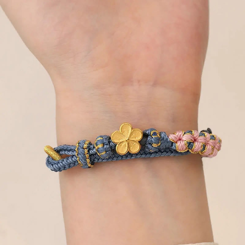 Bracelet de richesse en cuivre et fleur de pêcher pour l'équilibre