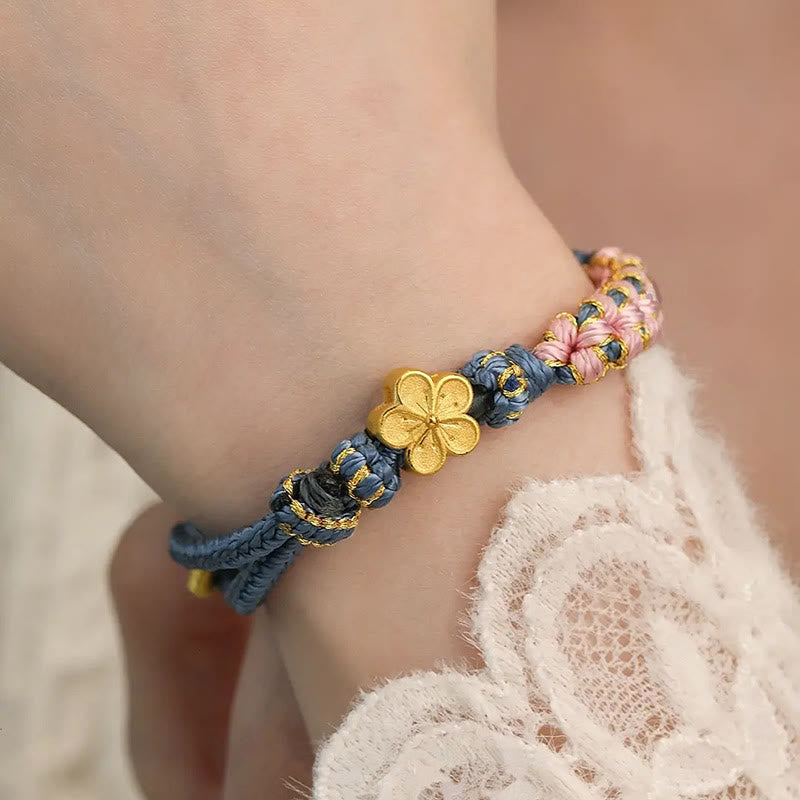Bracelet de richesse en cuivre et fleur de pêcher pour l'équilibre