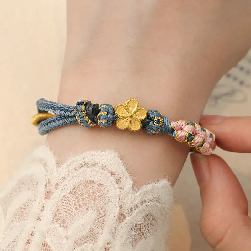 Bracelet de richesse en cuivre et fleur de pêcher pour l'équilibre