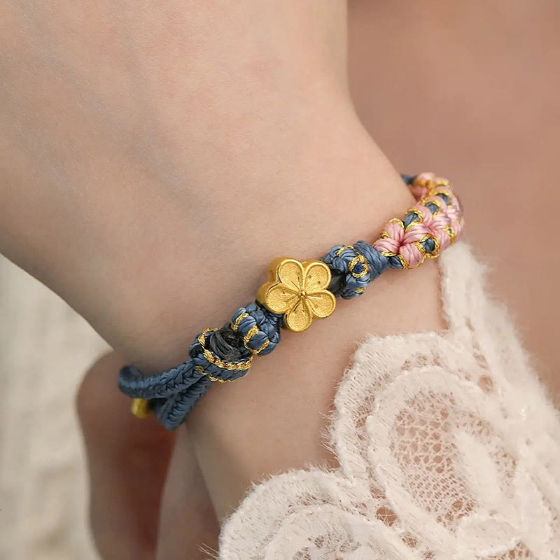 Bracelet de richesse en cuivre et fleur de pêcher pour l'équilibre