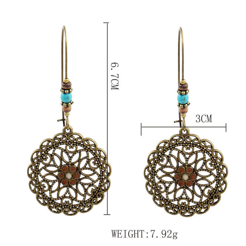 Boucles d'oreilles spirituelles en cuivre avec motif floral pour la chance et l'abondance
