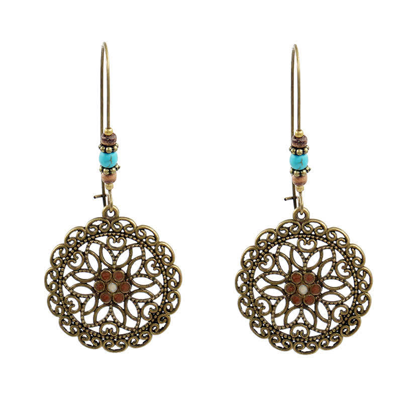 Boucles d'oreilles spirituelles en cuivre avec motif floral pour la chance et l'abondance