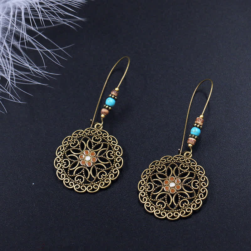 Boucles d'oreilles spirituelles en cuivre avec motif floral pour la chance et l'abondance