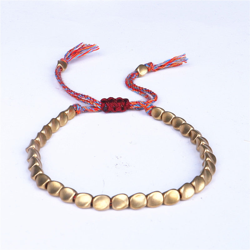 Bracelet tibétain porte-bonheur en cuivre avec perles colorées