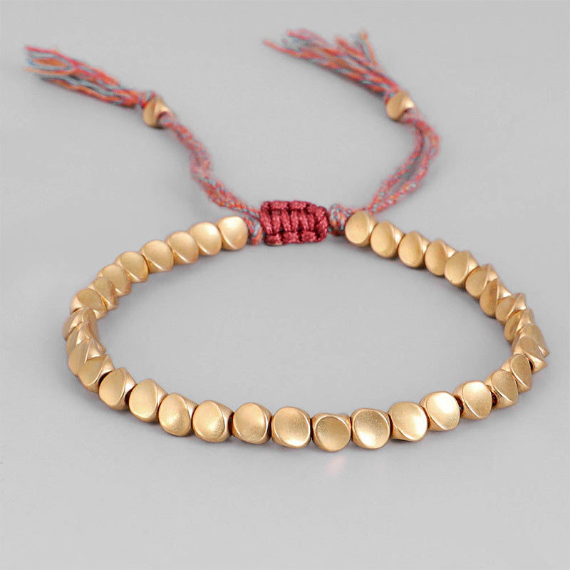 Bracelet tibétain porte-bonheur en cuivre avec perles colorées