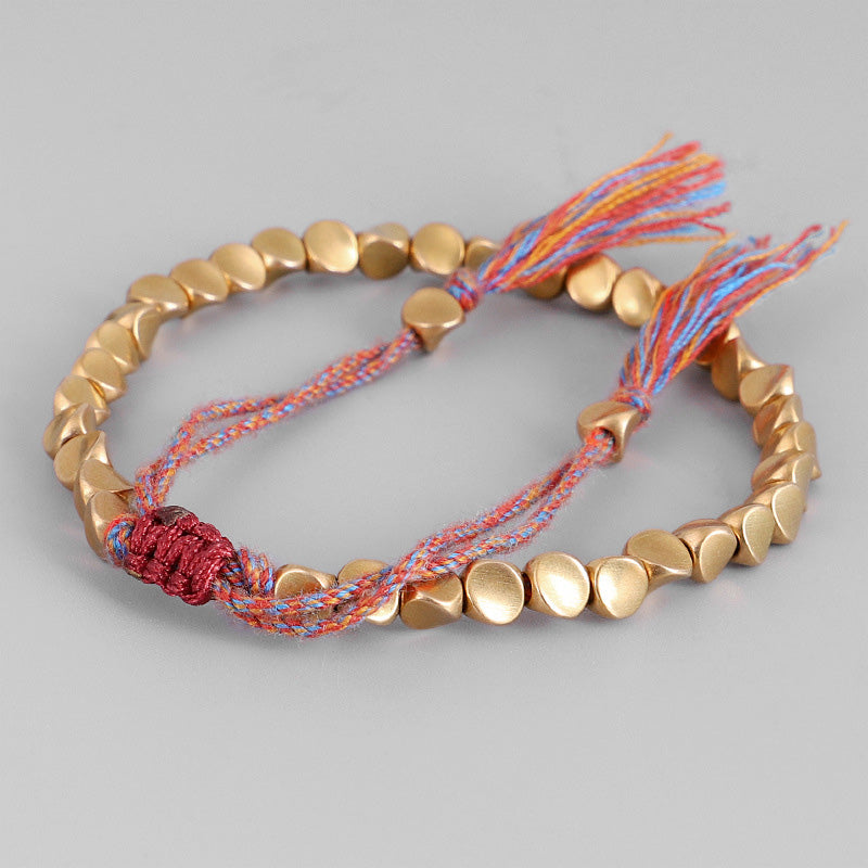 Bracelet tibétain porte-bonheur en cuivre avec perles colorées