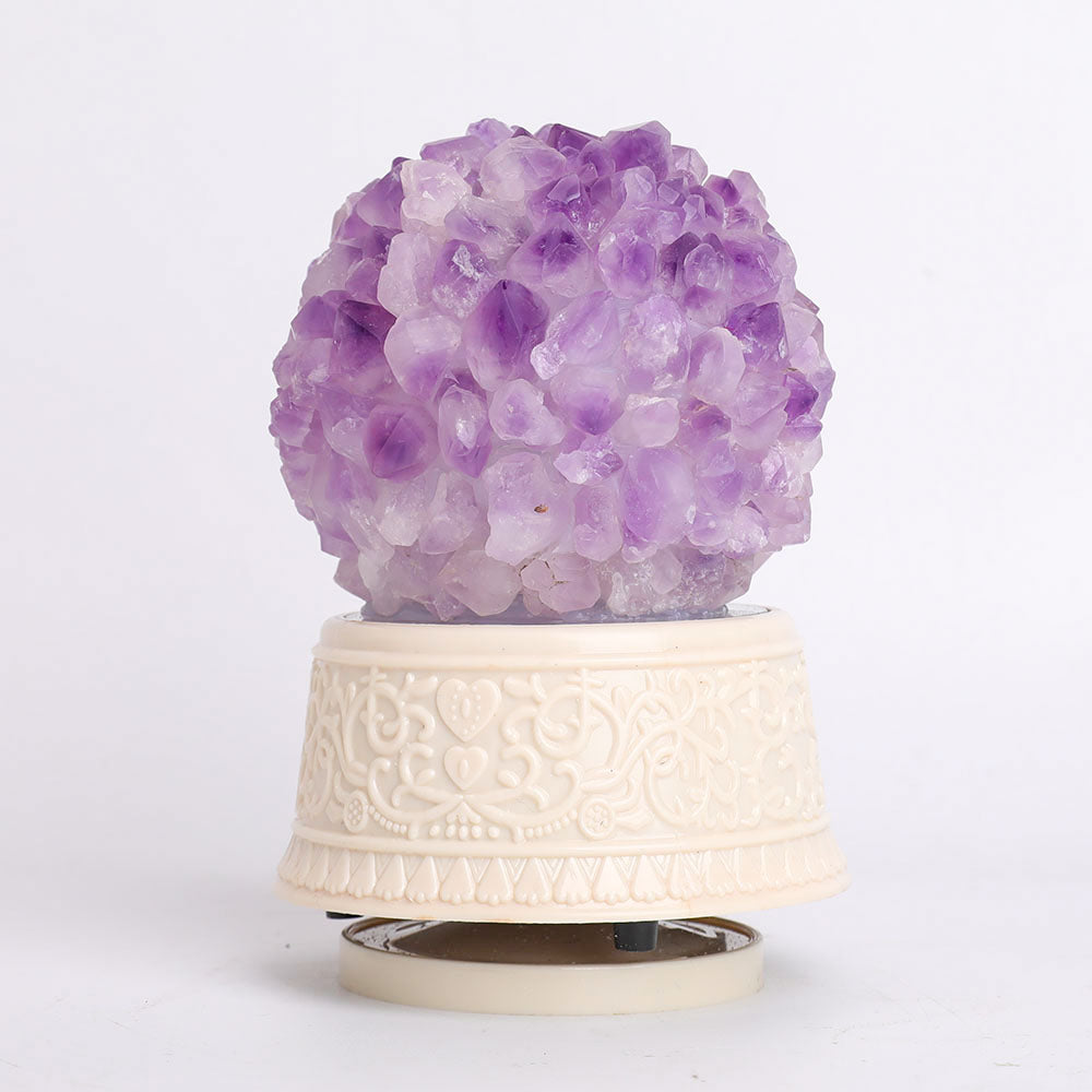 Boîte à musique en cristal avec spécimens de pierres précieuses naturelles : améthyste, quartz rose, fluorite, agate fleur