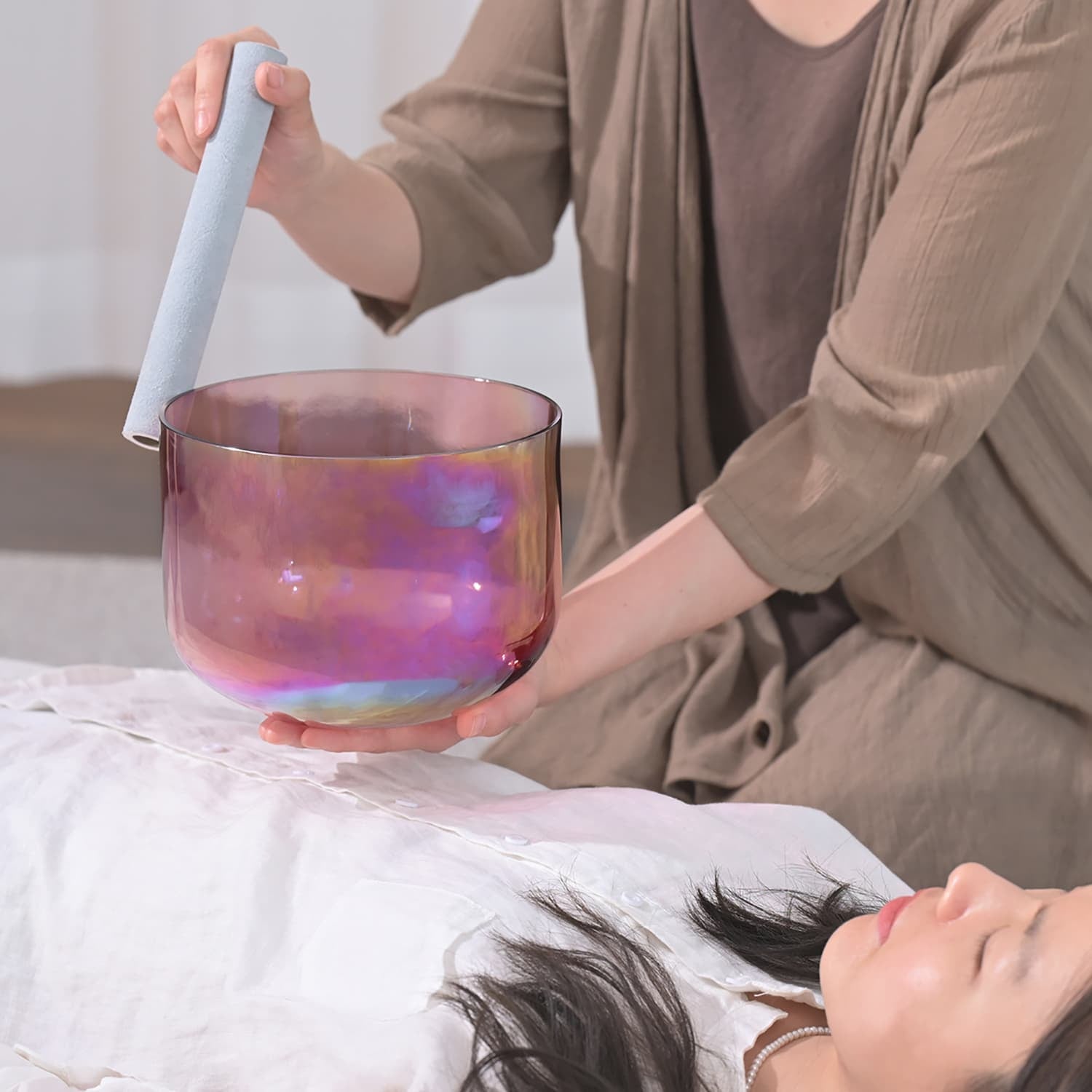 Iridescent Crystal Singing Bowl Light Nebula used in a sound healing session