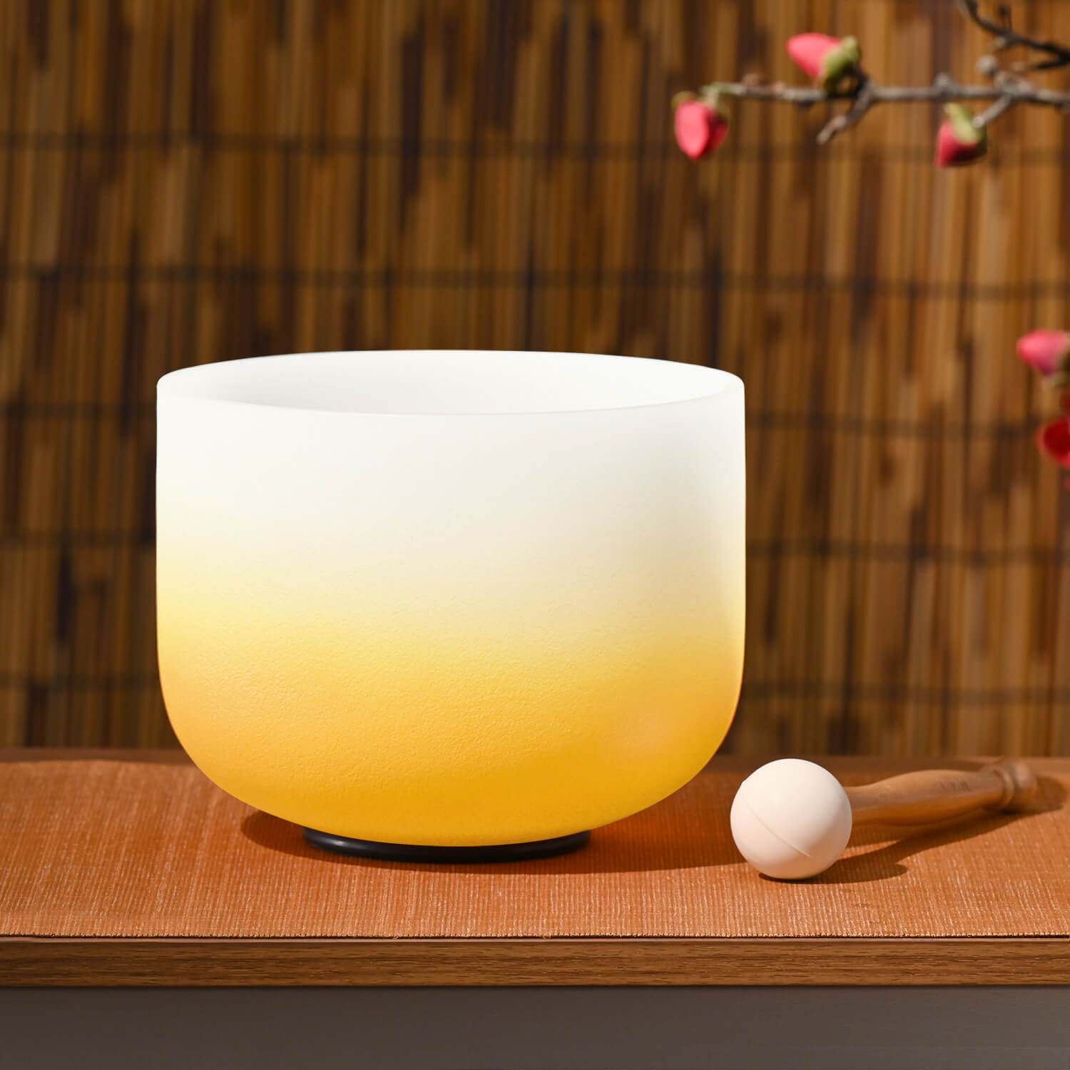 White frosted Crystal Singing Bowl with a warm yellow glow for Solar Plexus healing