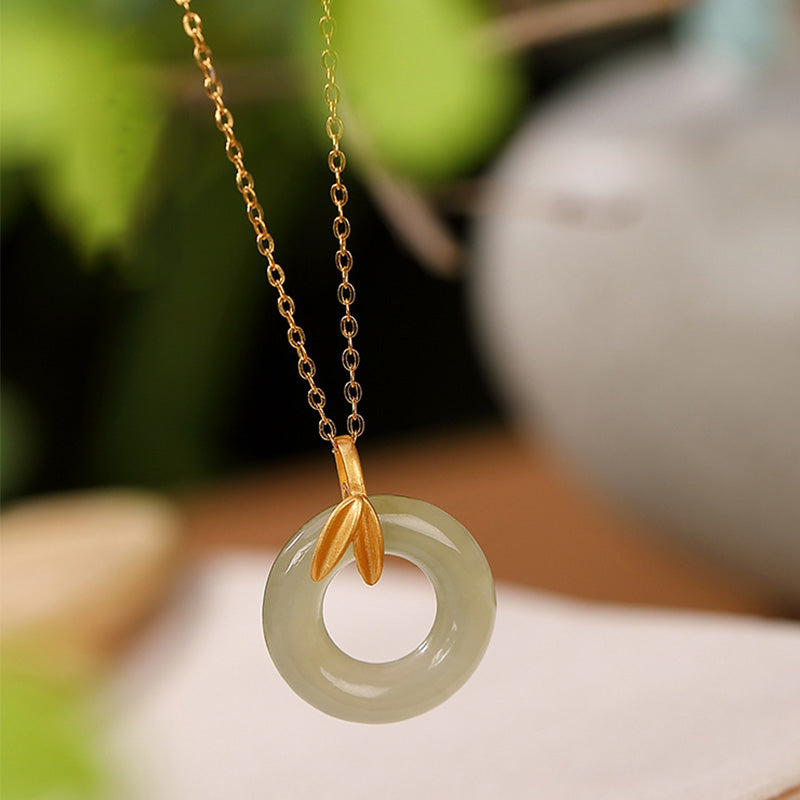 Collier en argent sterling et jade cyan avec boucle de paix pour l'harmonie